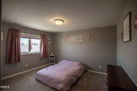 Bedroom - 608 14th St SE, Mandan, ND 58554 photo 5 of 6