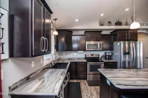 Kitchen - 608 14th St SE, Mandan, ND 58554 photo 3 of 4