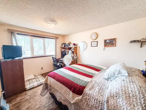 Bedroom - 908 6th St W, Williston, ND 58801 photo 5 of 6