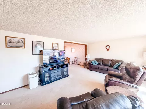 Living - 908 6th St W, Williston, ND 58801 photo 1 of 5
