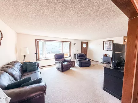 Living - 908 6th St W, Williston, ND 58801 photo 2 of 5