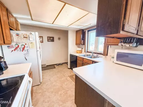 Kitchen - 908 6th St W, Williston, ND 58801 photo 3 of 3