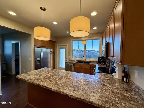 Kitchen - 823 14th St SE, Mandan, ND 58554 photo 2 of 4