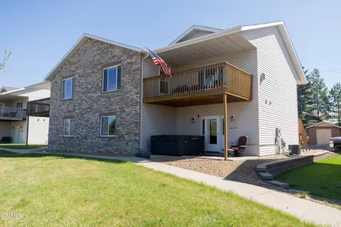 Exterior - 1075 Turnpike Ave E, Bismarck, ND 58501 photo 7 of 12