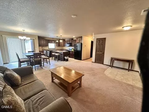 Living - 1405 Sharloh Loop, Bismarck, ND 58501 photo 1 of 2