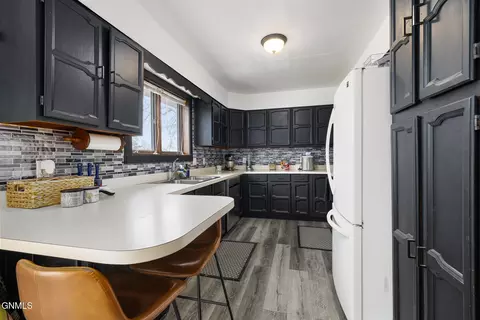Kitchen - 1302 10th Ave W, Williston, ND 58801 photo 2 of 2