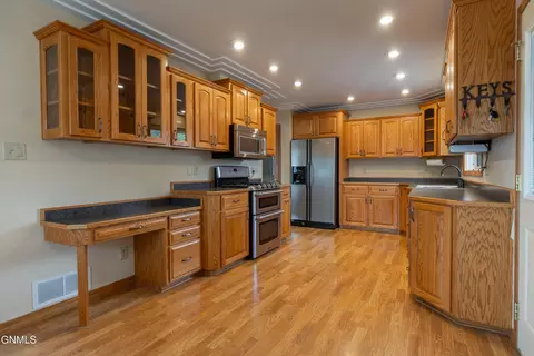 Kitchen - 908 Midway Dr, Bismarck, ND 58501 photo 2 of 6