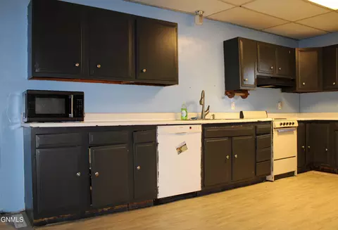 Kitchen - 311 2nd Ave NW, Killdeer, ND 58640 photo 1 of 2