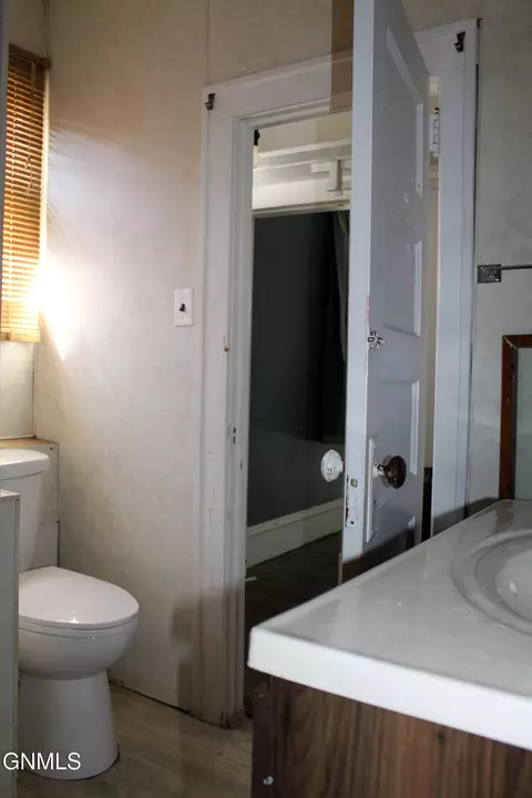 Bath - 311 2nd Ave NW, Killdeer, ND 58640 photo 1 of 4