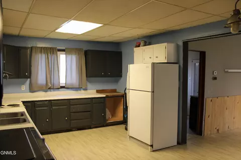Kitchen - 311 2nd Ave NW, Killdeer, ND 58640 photo 2 of 2