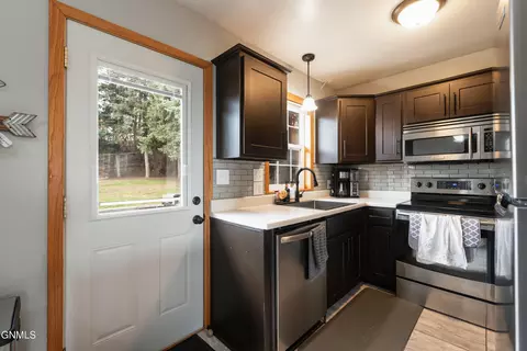 Kitchen - 1002 3rd St NW, Mandan, ND 58554 photo 1 of 2