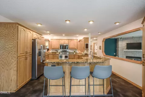 Kitchen - 800 Munich Dr, Bismarck, ND 58504 photo 4 of 12