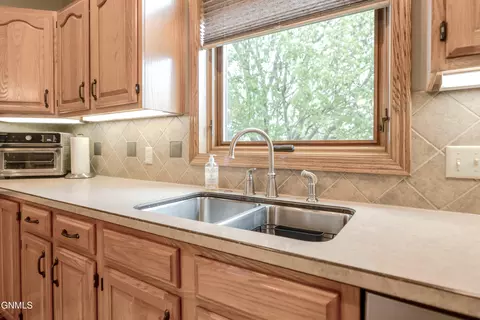 Kitchen - 2701 9th Ave NW, Mandan, ND 58554 photo 5 of 7