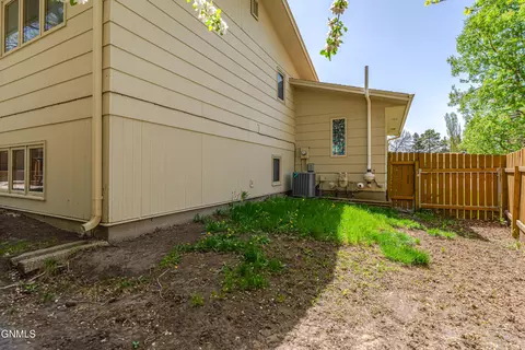 Exterior - 208 Redstone Dr, Bismarck, ND 58503 photo 11 of 12