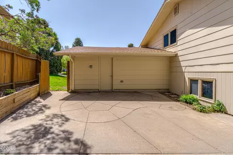 Exterior - 208 Redstone Dr, Bismarck, ND 58503 photo 6 of 12