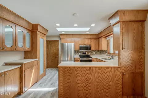 Kitchen - 208 Redstone Dr, Bismarck, ND 58503 photo 2 of 10