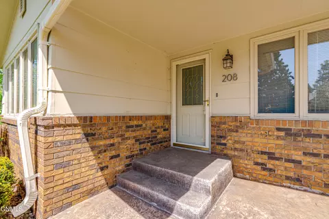 Exterior - 208 Redstone Dr, Bismarck, ND 58503 photo 5 of 12