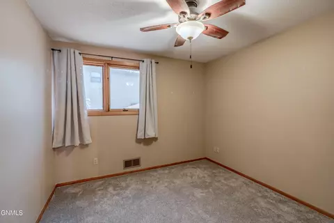 Bedroom - 208 Redstone Dr, Bismarck, ND 58503 photo 7 of 13