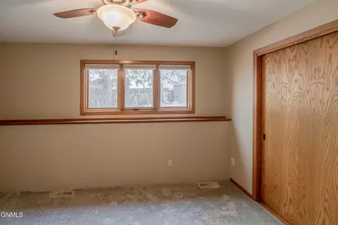Bedroom - 208 Redstone Dr, Bismarck, ND 58503 photo 11 of 13