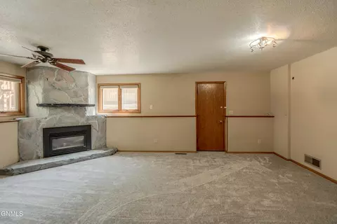 Living - 208 Redstone Dr, Bismarck, ND 58503 photo 7 of 8
