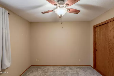 Bedroom - 208 Redstone Dr, Bismarck, ND 58503 photo 9 of 13