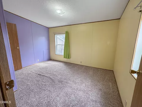 Bedroom - 407 Main St, Max, ND 58759 photo 4 of 6