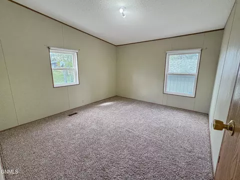 Bedroom - 407 Main St, Max, ND 58759 photo 5 of 6