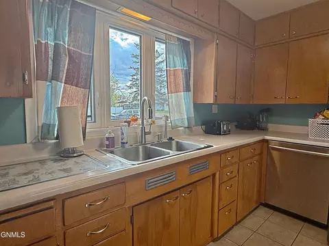 Kitchen - 1238 7th Ave W, Williston, ND 58801 photo 7 of 8
