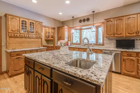 Kitchen - 772 Munich Dr, Bismarck, ND 58504 photo 5 of 11