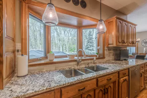 Kitchen - 772 Munich Dr, Bismarck, ND 58504 photo 7 of 11