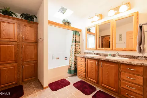 Bath - 8550 Willow Rd N, Mandan, ND 58554 photo 2 of 2