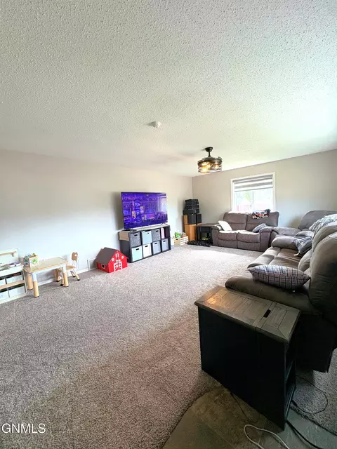 Living - 901 4th Ave W, Williston, ND 58801 photo 2 of 4