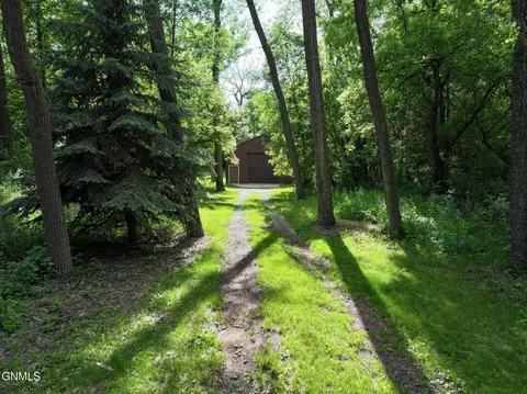 Exterior - 1509 River Dr NE, Mandan, ND 58554 photo 7 of 11