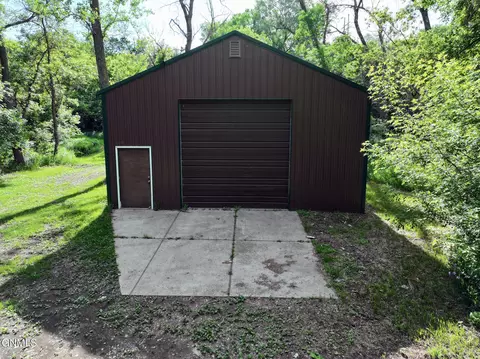 Exterior - 1509 River Dr NE, Mandan, ND 58554 photo 8 of 11