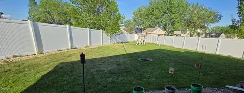 Exterior - 1614 Creekside Dr W, Williston, ND 58801 photo 3 of 7