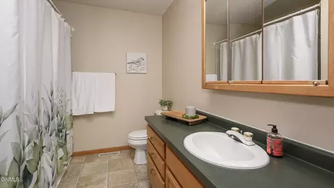 Bath - 6201 Sully Dr, Bismarck, ND 58504 photo 3 of 6