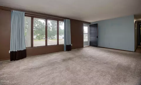 Living - 807 20th St E, Williston, ND 58801 photo 2 of 2