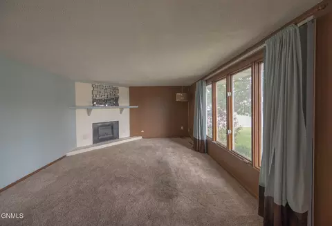 Living - 807 20th St E, Williston, ND 58801 photo 1 of 2