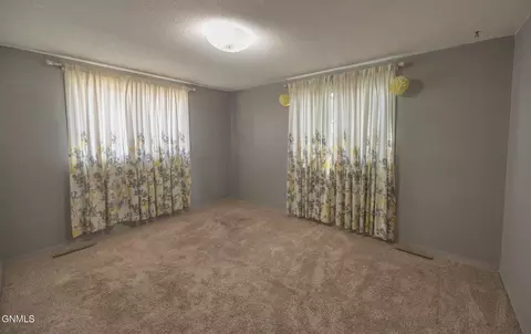 Bedroom - 807 20th St E, Williston, ND 58801 photo 2 of 4
