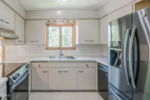 Kitchen - 106 Divide Ave E, Bismarck, ND 58501 photo 2 of 5