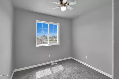 Bedroom - 1311 23rd St E, Williston, ND 58801 photo 3 of 4
