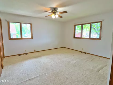 Bedroom - 911 3rd Ave E, Williston, ND 58801 photo 9 of 11