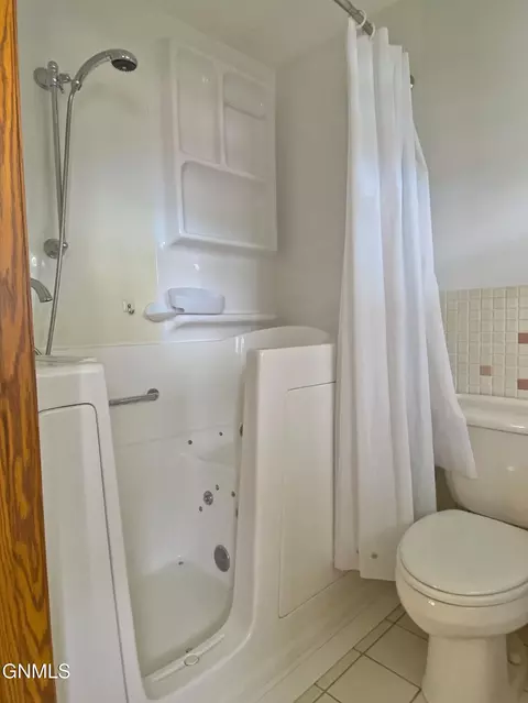 Bath - 911 3rd Ave E, Williston, ND 58801 photo 1 of 10