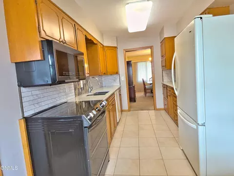 Kitchen - 911 3rd Ave E, Williston, ND 58801 photo 1 of 4