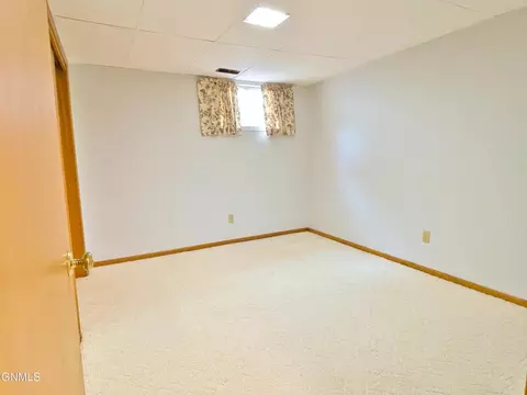 Bedroom - 911 3rd Ave E, Williston, ND 58801 photo 10 of 11