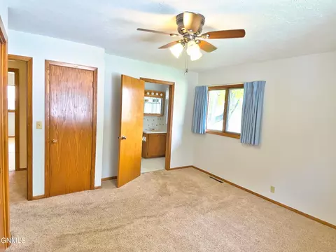 Bedroom - 911 3rd Ave E, Williston, ND 58801 photo 5 of 11