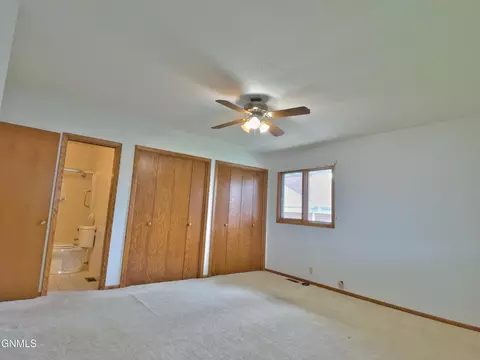 Bedroom - 911 3rd Ave E, Williston, ND 58801 photo 7 of 11