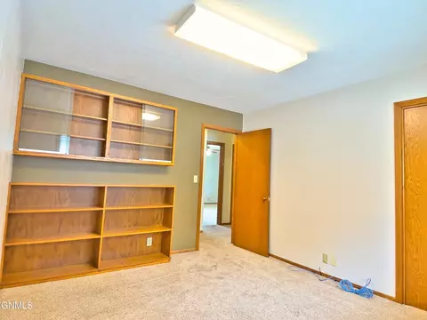 Bedroom - 911 3rd Ave E, Williston, ND 58801 photo 3 of 11