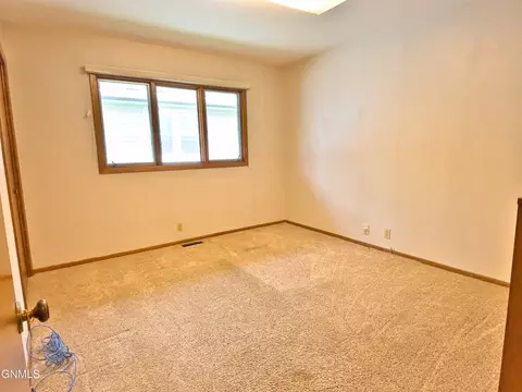 Bedroom - 911 3rd Ave E, Williston, ND 58801 photo 1 of 11