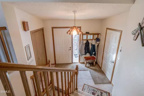 Entry Way - 410 3rd St, Riverdale, ND 58565 photo 1 of 9